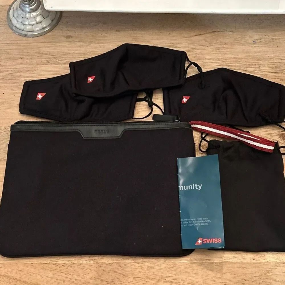NWOT Bally + Swiss five piece travel bag pouch and three face masks black